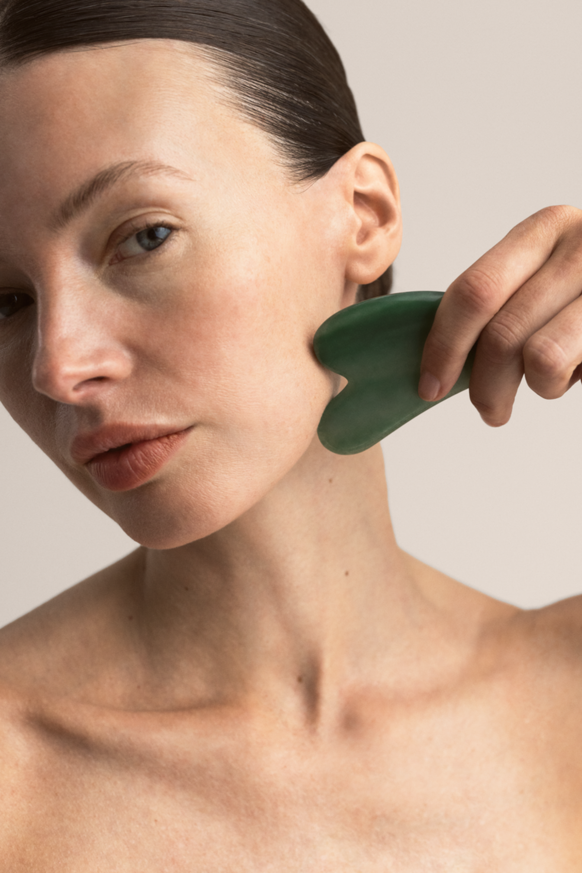 lavera Gua Sha Face Massage Tool during application